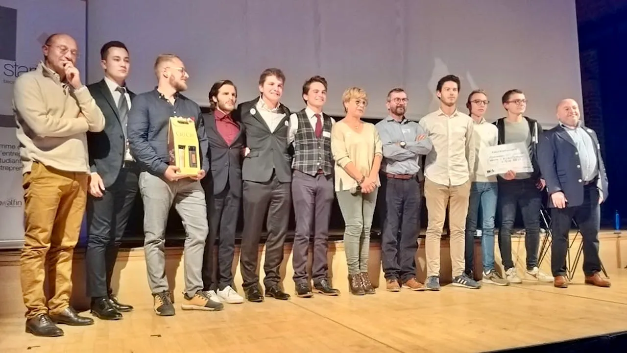 Get Your Way team on stage with their prize